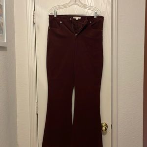 Chelsea & Violet size 31 high waisted flare corduroy pants in a red-brown color.